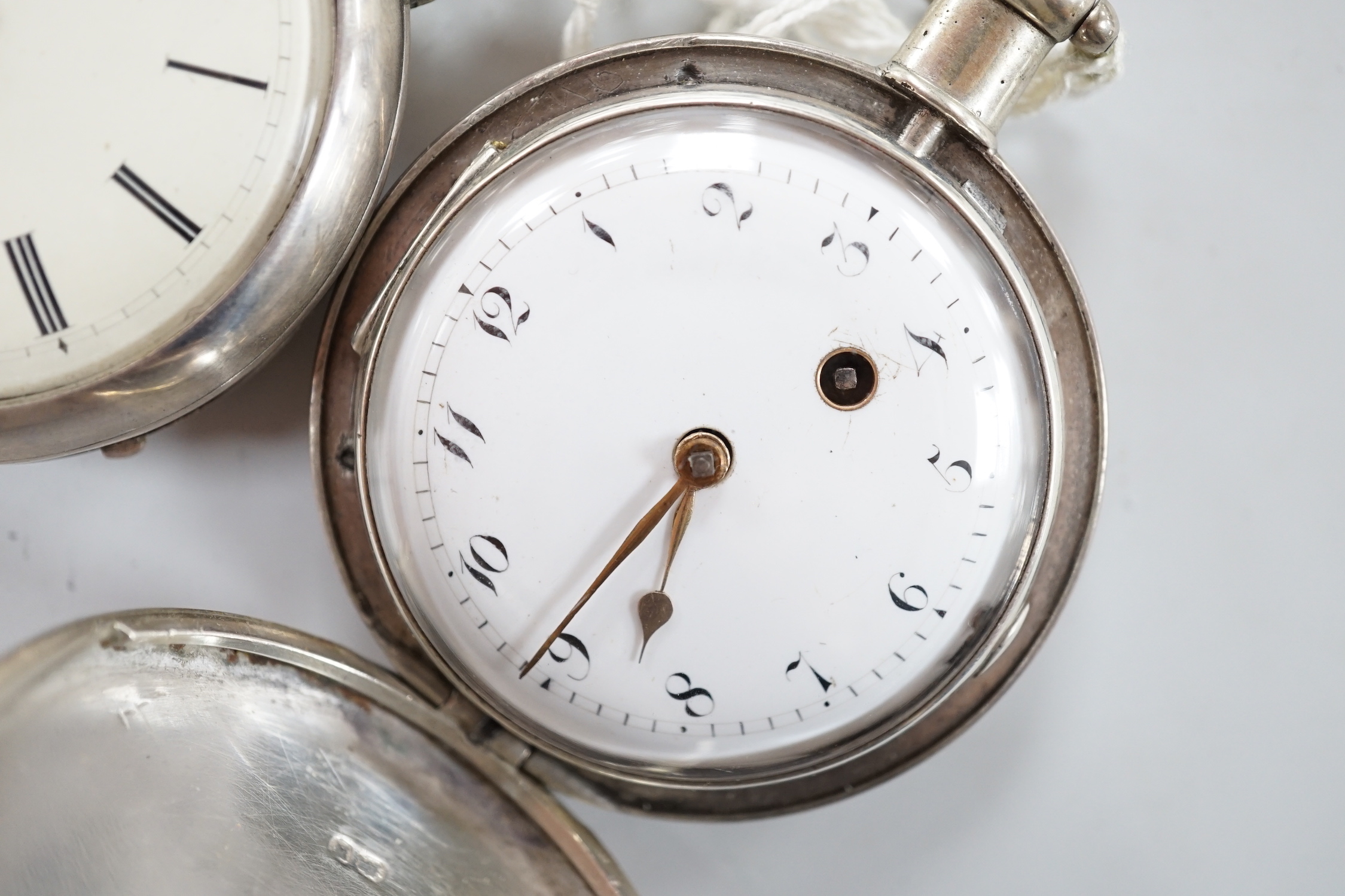 A 19th century silver pair cased kewind verge pocket watch, by Broad of London and a similar hunter pocket watch by Brown of Winchester.